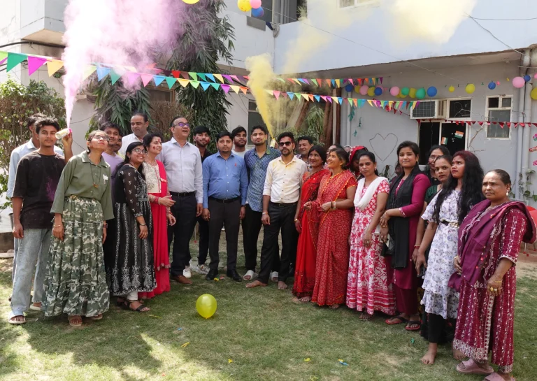 Residents and staff gathered together during an outdoor event at Saksham by Kriti