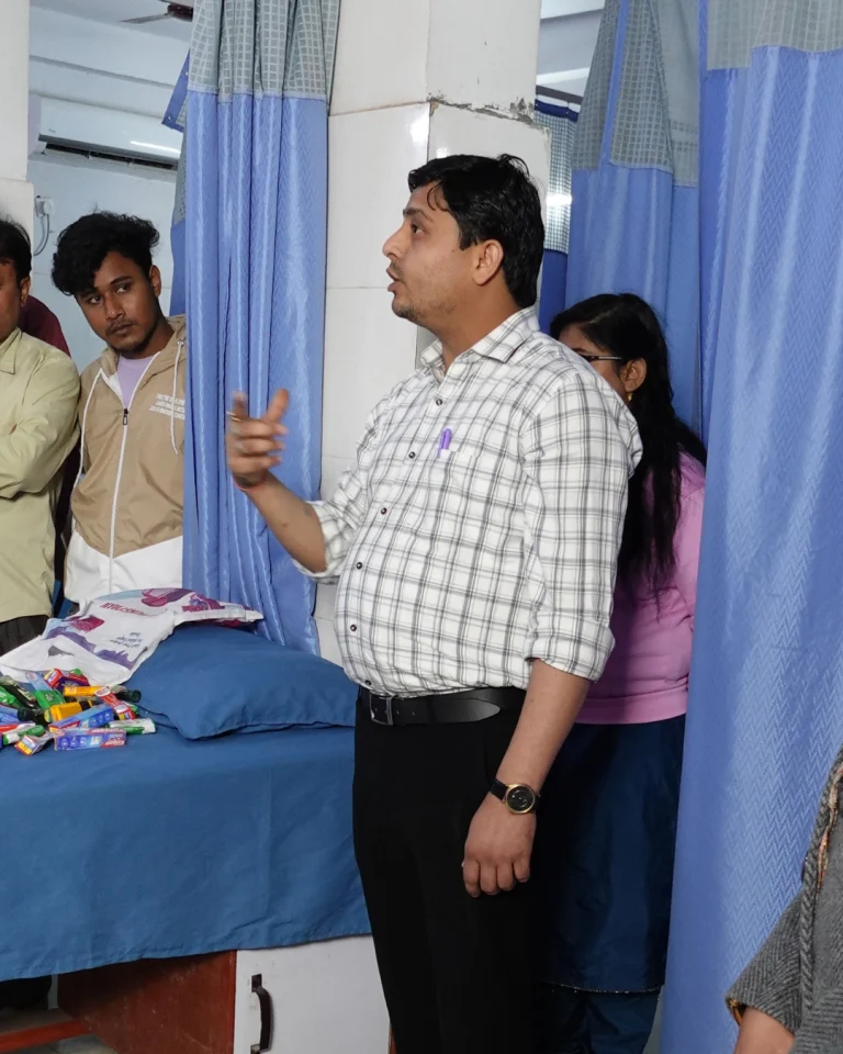 Visitors touring the residential care environment at Saksham by Kriti