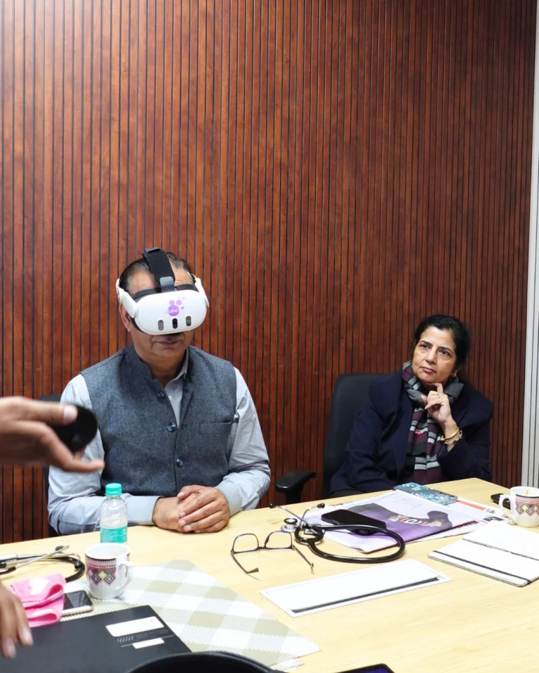 Technology-supported activity with a participant using a virtual reality headset at Saksham by Kriti