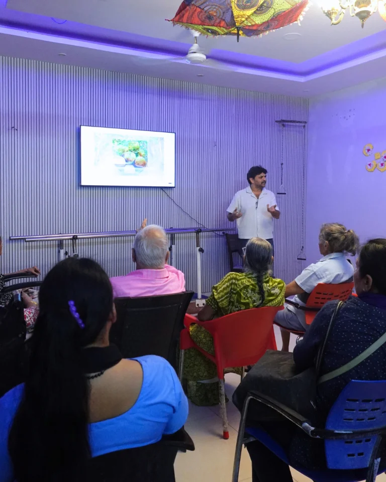 Group session with participants and a presenter at Saksham by Kriti